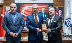 Raw Data Library’den EBYÜ Rektörü Levent’e Plaket